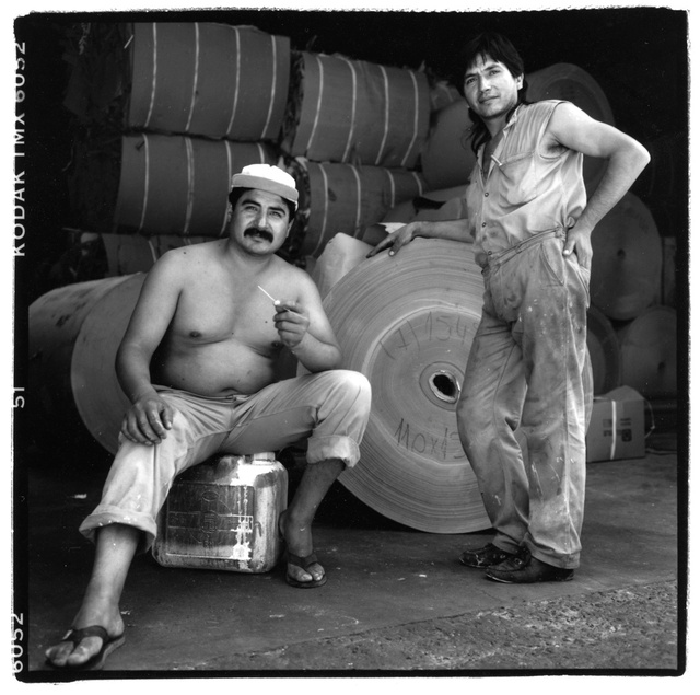 Arg., 2 men, paper rolls238.jpg